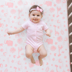 TCOYIWL crib sheet elastic edges ensure a snug fit on standard crib mattresses.