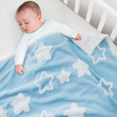 TCOYIWL baby blanket for toddlers with reversible star jacquard pattern for cozy sleep.