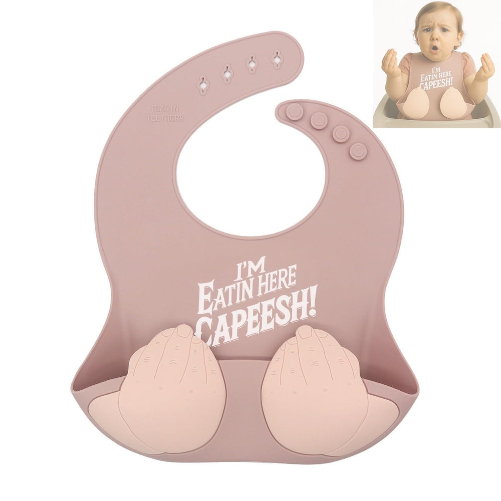 Teasin' Teethers Capeesh Pink bib with pocket catching spills during meals