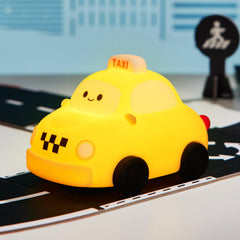 TechCharm taxi wheels rotate feature adds playful motion for bedtime storytelling and play.