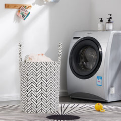 TECHMILLY basket with long handles for easy carrying of laundry or toys.