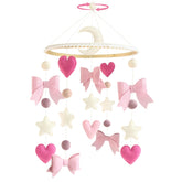 Teeloray pink bow mobile crib focal point for a baby girl's nursery.