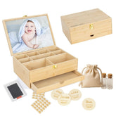 The Conscious Mom baby keepsake box with gold latch provides secure memory storage.