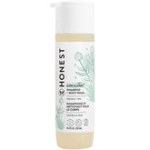 The Honest Company 2-in-1 bottle shown, tear-free formula ideal for sensitive skin.