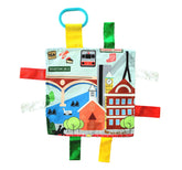 The Learning Lovey Baby Jack & Co tag toy closeup shows tactile plush texture for sensory play.