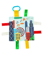The Learning Lovey Baby Jack Co 8x8 crinkle Chicago toy supports tactile exploration and city learning.