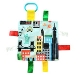 The Learning Lovey Baby Jack Co NYC tag toy closeup highlights soft fabric and secure stitching for safety.