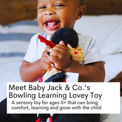 The Learning Lovey sensory plush blanket on stroller demonstrates on-the-go learning and soothing play
