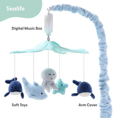 The Peanutshell crib mobile-dolphin offers gentle motion for visual comfort.