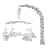 The Peanutshell crib mobile with grey elephants soothing baby during naps