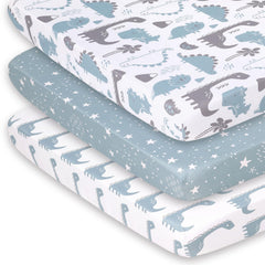 The Peanutshell dinosaur-prints mini crib sheet β cozy, colorful nap-time comfort.