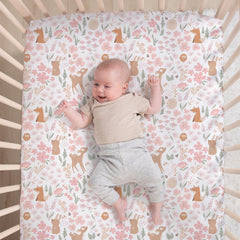 The Peanutshell Fairytale Forest bed skirt adds a polished finish to the crib decor.