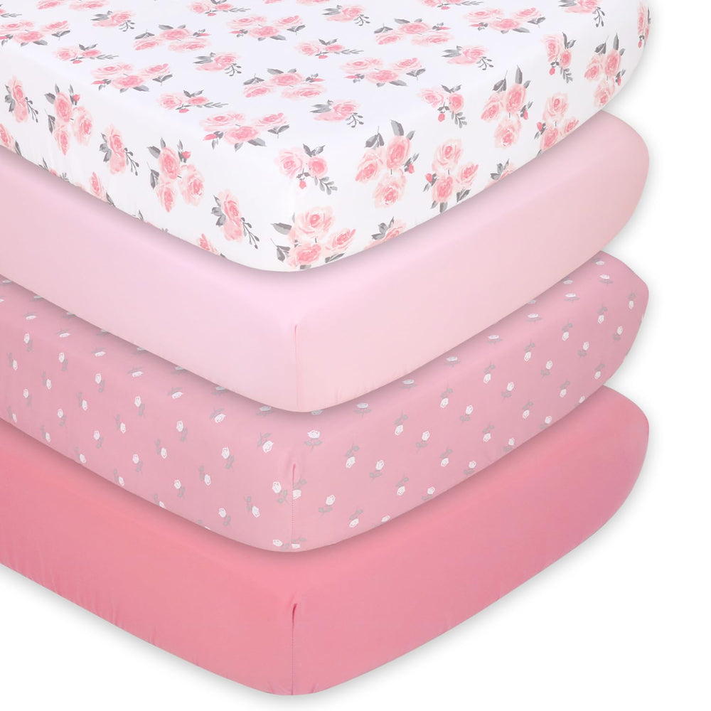 The Peanutshell floral crib sheet bouquet pattern promotes gentle, cozy sleep for baby girl