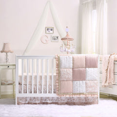 The Peanutshell Grace rosebuds closeup highlights durable, machine-washable fabric for easy care.