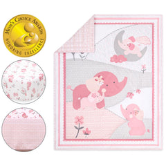 The Peanutshell pink elephant fitted sheet on a standard crib mattress for secure fit.