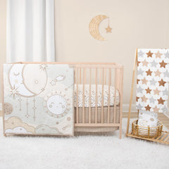The Peanutshell Starry Skies reversible quilt for cozy crib warmth
