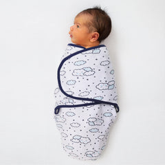 The Peanutshell swaddle navy and aqua cloud image emphasizes cozy breathable fabric for nights