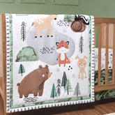 The Peanutshell woodland camo crib quilt with forest animals adds cozy warmth for nap time.