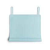 The Table Tyke edge bumper placemat shields delicate gums from sharp table edges during meals.