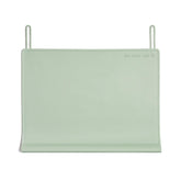 The Table Tyke XL placemat in sage green with teething edge cushions little mouths during meals.
