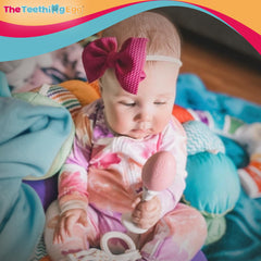 The Teething Egg rattle inside adds engaging sound for curious babies