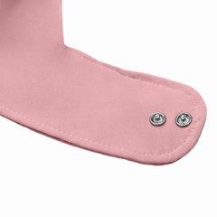 The Ollie lavender bib on baby demonstrates stylish drool-catching design for outfits.