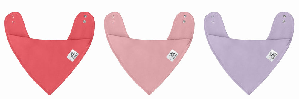 The Ollie baby bib moisture-wicking hero keeps skin dry during drool and meals.