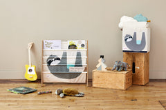 Three Sprouts toy storage cube collapsible design folds flat for space-saving storage.
