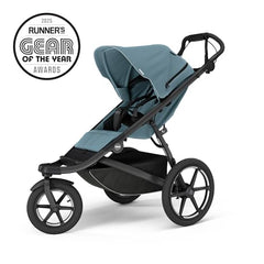 Thule Urban Glide 3 blue front view highlights easy steering on city streets.