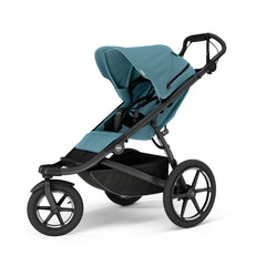 Thule Urban Glide 3 blue side view shows all-terrain readiness for everyday adventures.