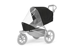 Thule Urban Glide 3 rain cover on stroller demonstrates clear visibility and wind protection.