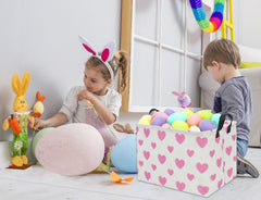 TIBAOLOVER heart-pattern baby basket adds cute decor while storing books.
