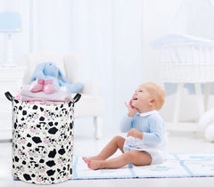 TIBAOLOVER laundry basket in a nursery with toys and clothes nearby