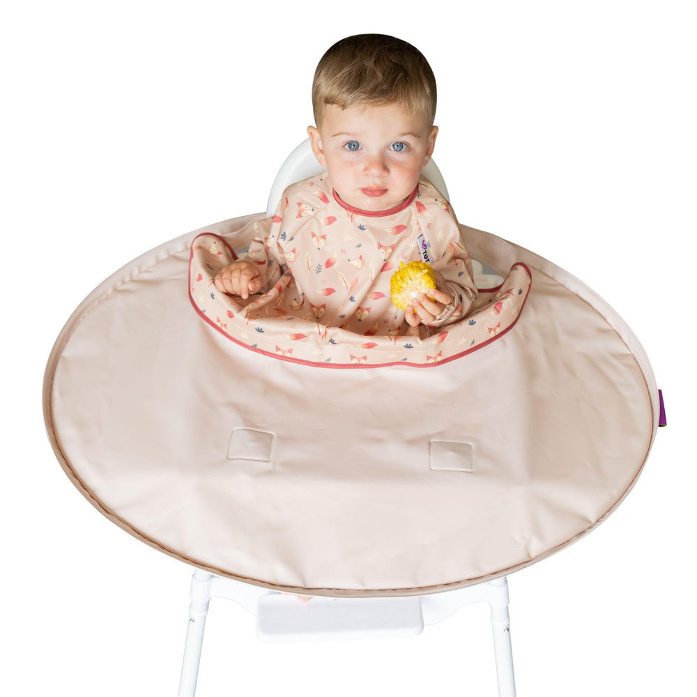 Tidy Tot bib-tray kit sand assembly shows setup for mess-free meals