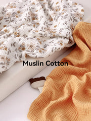 TILLYOU 2-pack muslin crib sheets closeup cotton texture; breathable baby comfort
