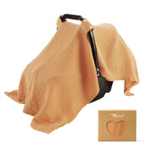 TILLYOU baby car seat cover close-up on breathable muslin for gentle skin protection.