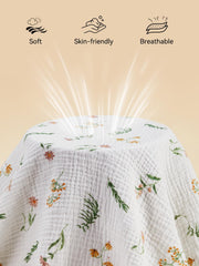 TILLYOU Daisy crib sheet on a standard mattress highlights breathable fabric and secure fit.