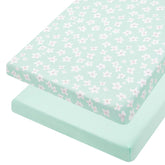 TILLYOU mini-crib-fitted-sheet Fresh Flowers closeup shows snug fit for secure night sleep