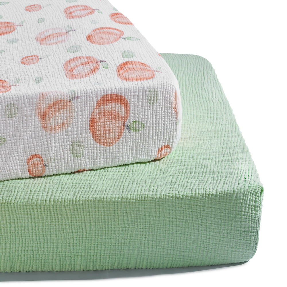 TILLYOU muslin crib sheet peach dot provides breathable skin-friendly comfort for nap times.