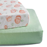 TILLYOU muslin crib sheet peach dot provides breathable skin-friendly comfort for nap times.