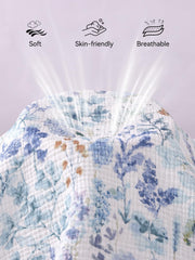 TILLYOU Muslin mini crib sheet elastic edge closeup shows secure, wrinkle-free edge