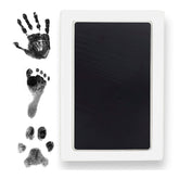 Tiny Gifts Clean Touch inkpad safely captures a baby's hands for lasting keepsakes.