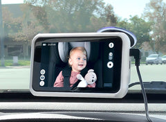 Tiny Traveler backseat mount setup shows secure, hands-free monitoring during car rides