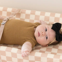 Tiny Twinkle changing pad anti-slip base prevents shifting during diapering.