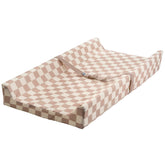Tiny Twinkle diaper changing pad with waterproof cover for mess-free diaper changes.