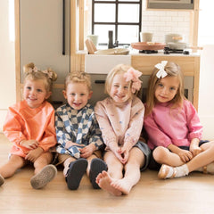 Tiny Twinkle waterproof material closeup highlights wipe-clean ease and quick-dry fabric
