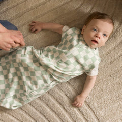 Tiny Twinkle machine-washable sleep sack laid flat for easy care.