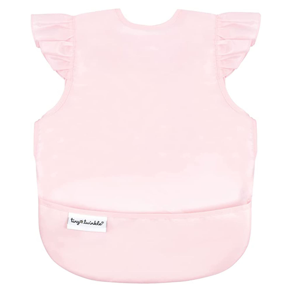 Tiny Twinkle Mess-Proof Baby Bib in rose on a toddler provides mess protection during meals.