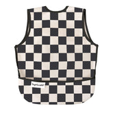 Tiny Twinkle Mess-Proof Bib black checkers close-up shows durable, spill-ready fabric