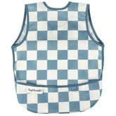 Tiny Twinkle mess-proof bib in blue checkers on a boy for reduced cleanup during meals.